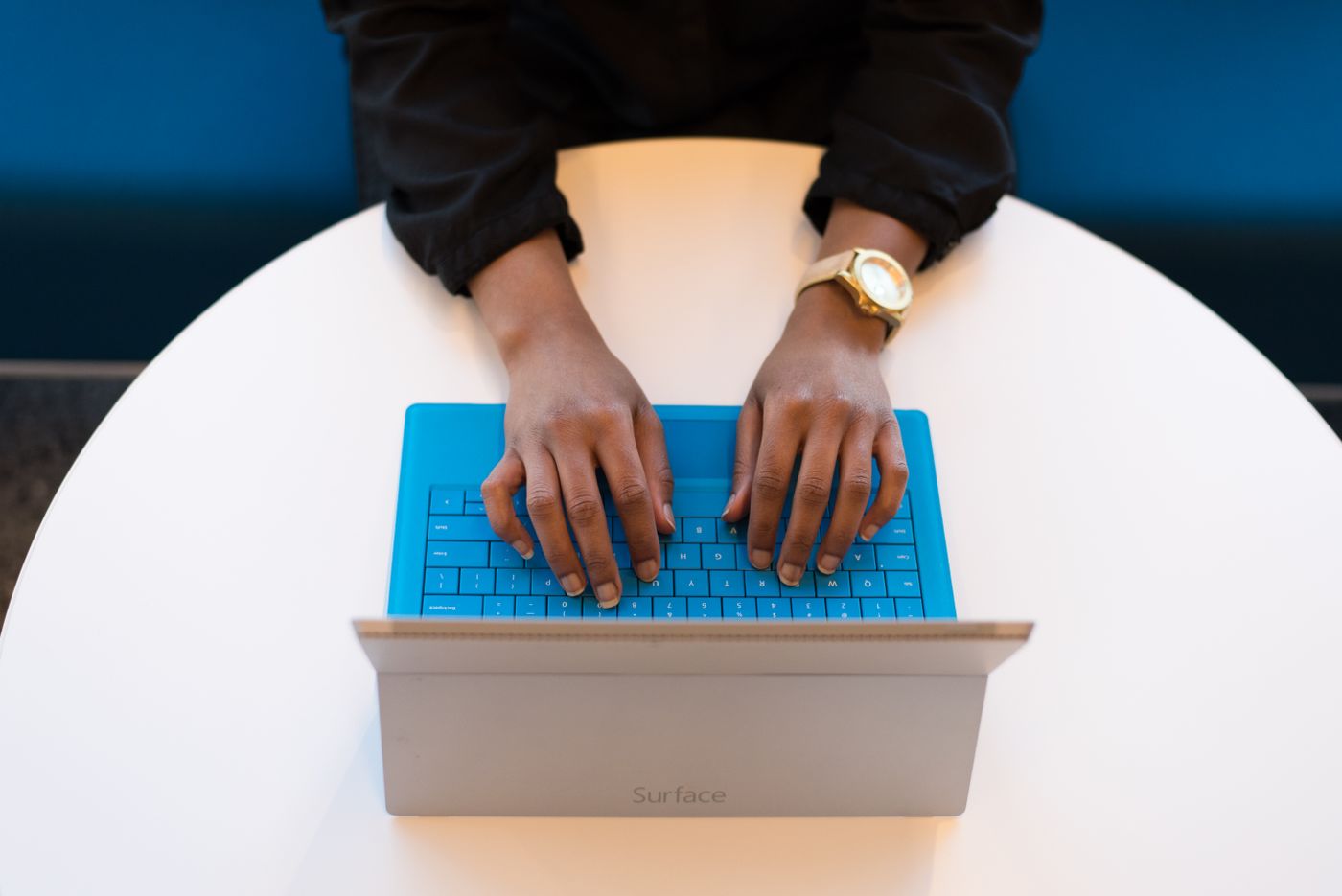 Data researcher checking records on a laptop