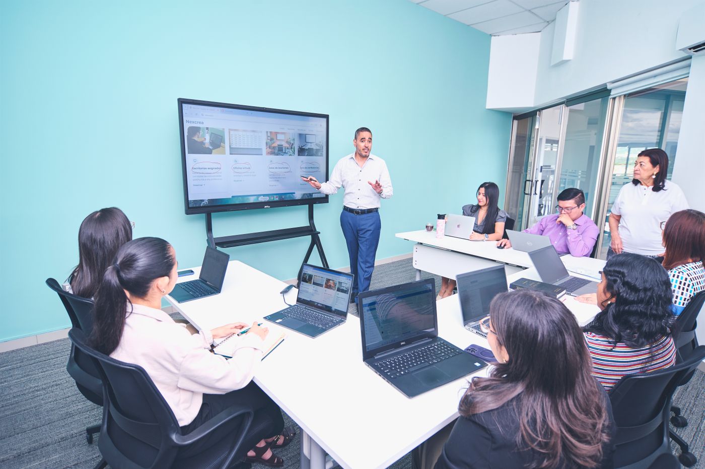 A professional presenting to stakeholders
