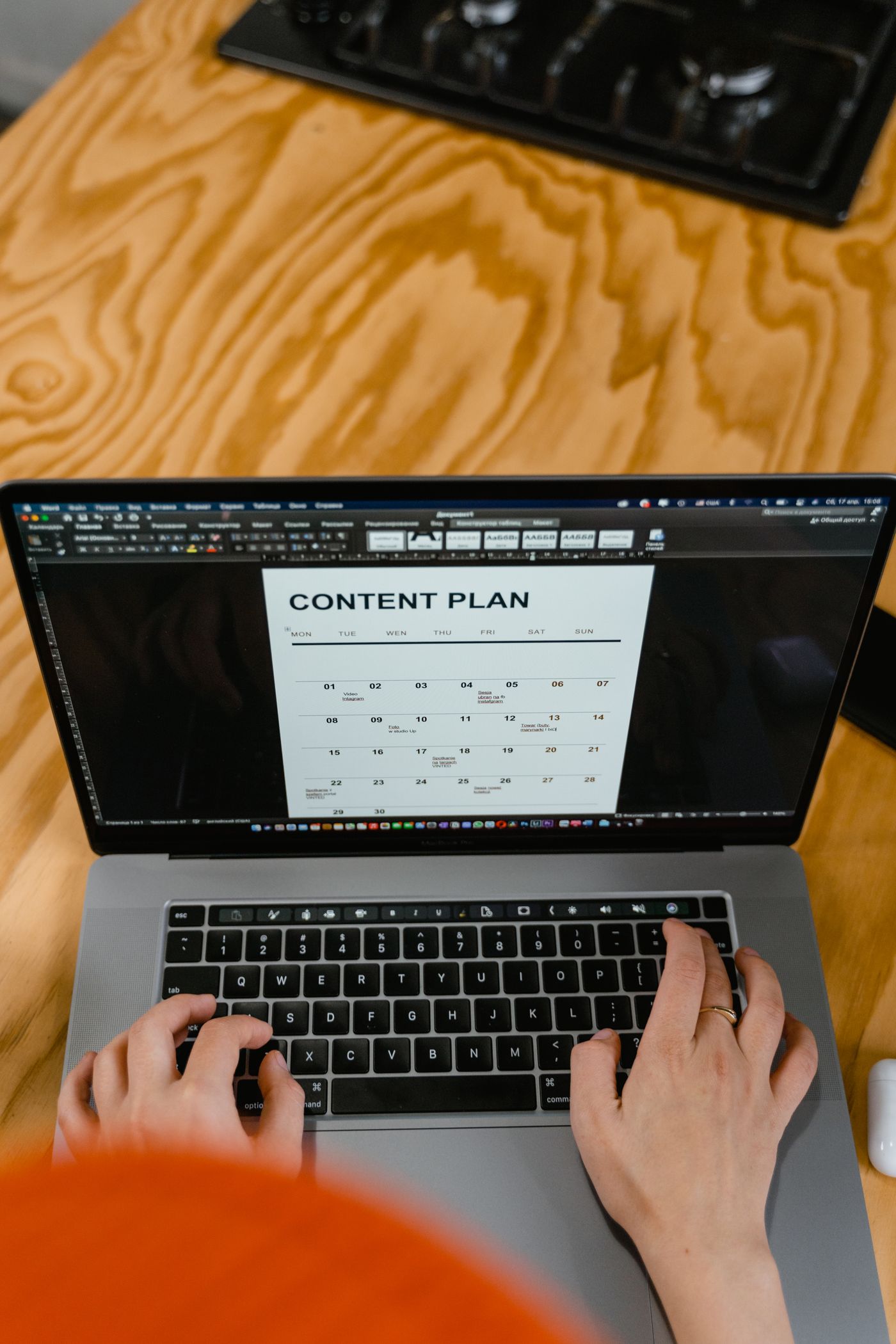 Editorial content calendar being planned on a laptop