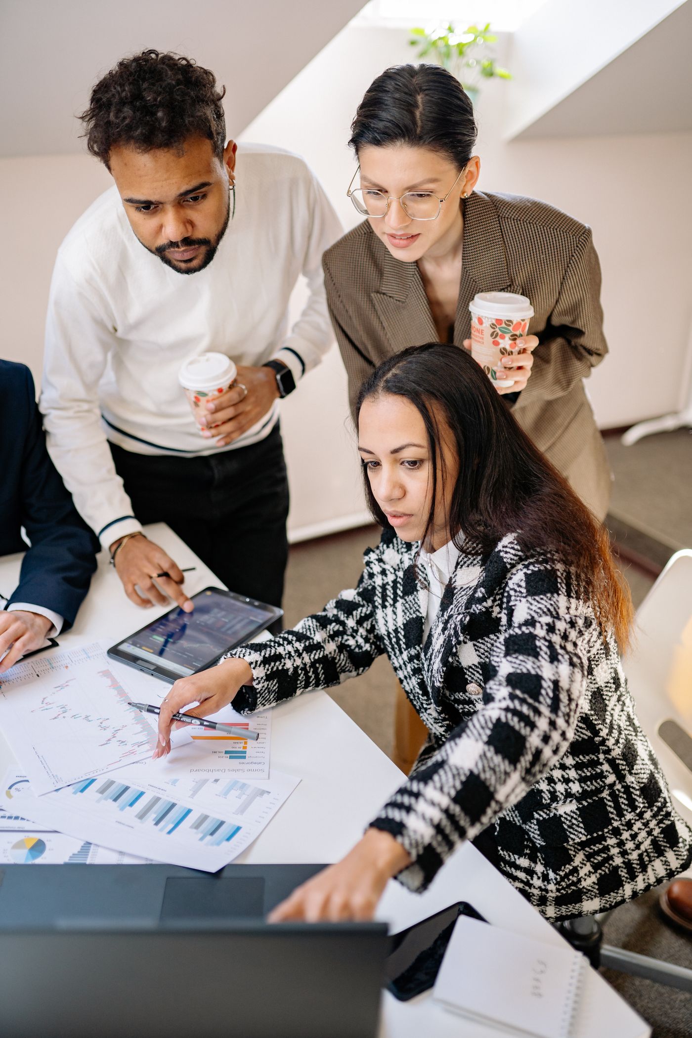 Business professionals reviewing campaign results